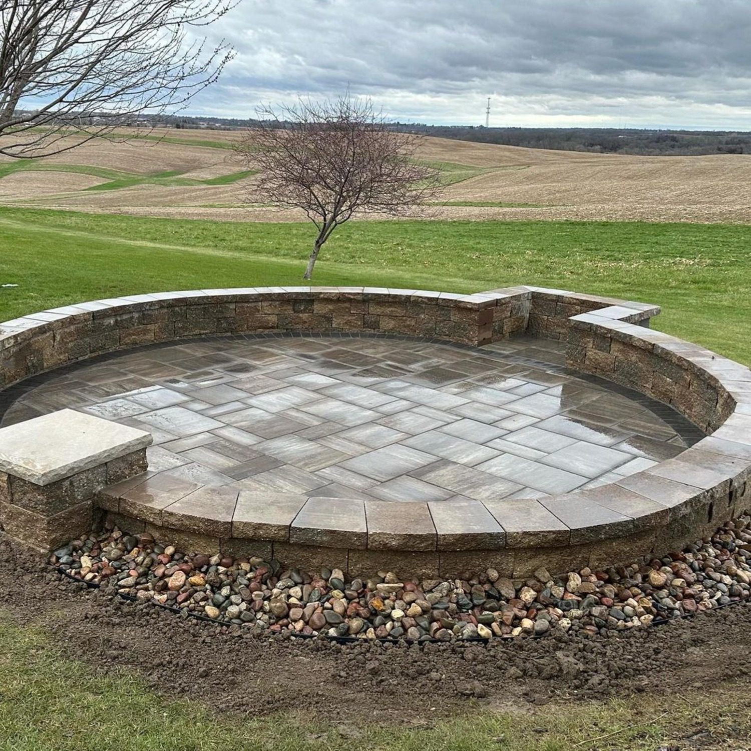 A patio build in Asbury showcased in the Gallery of Work for Ryan's Outdoor Services.